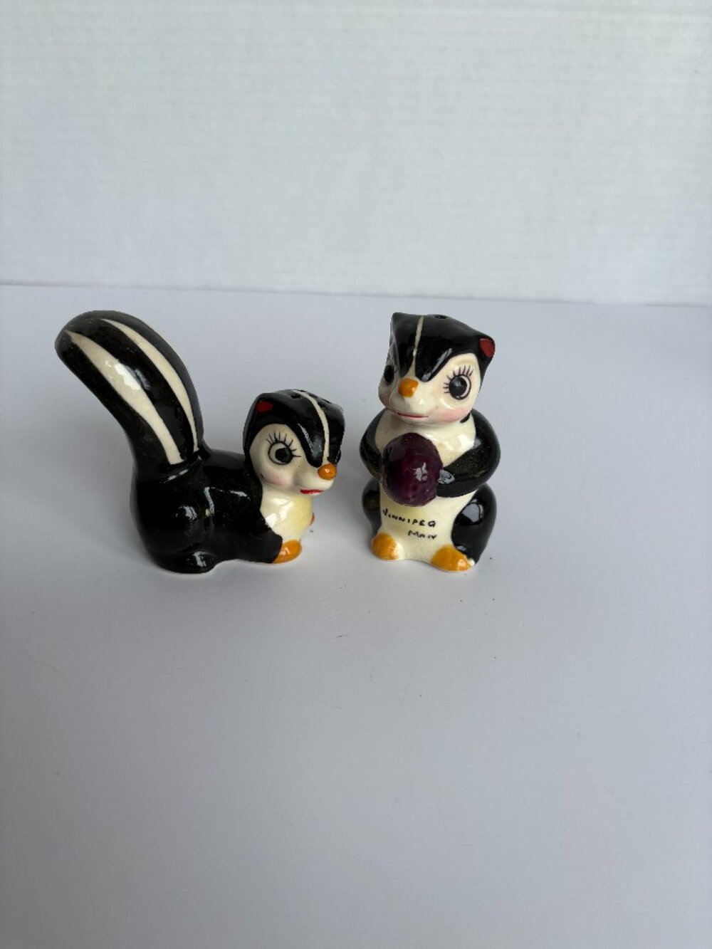 Vintage Ceramic Skunk Souvenir Salt and Pepper Shakers